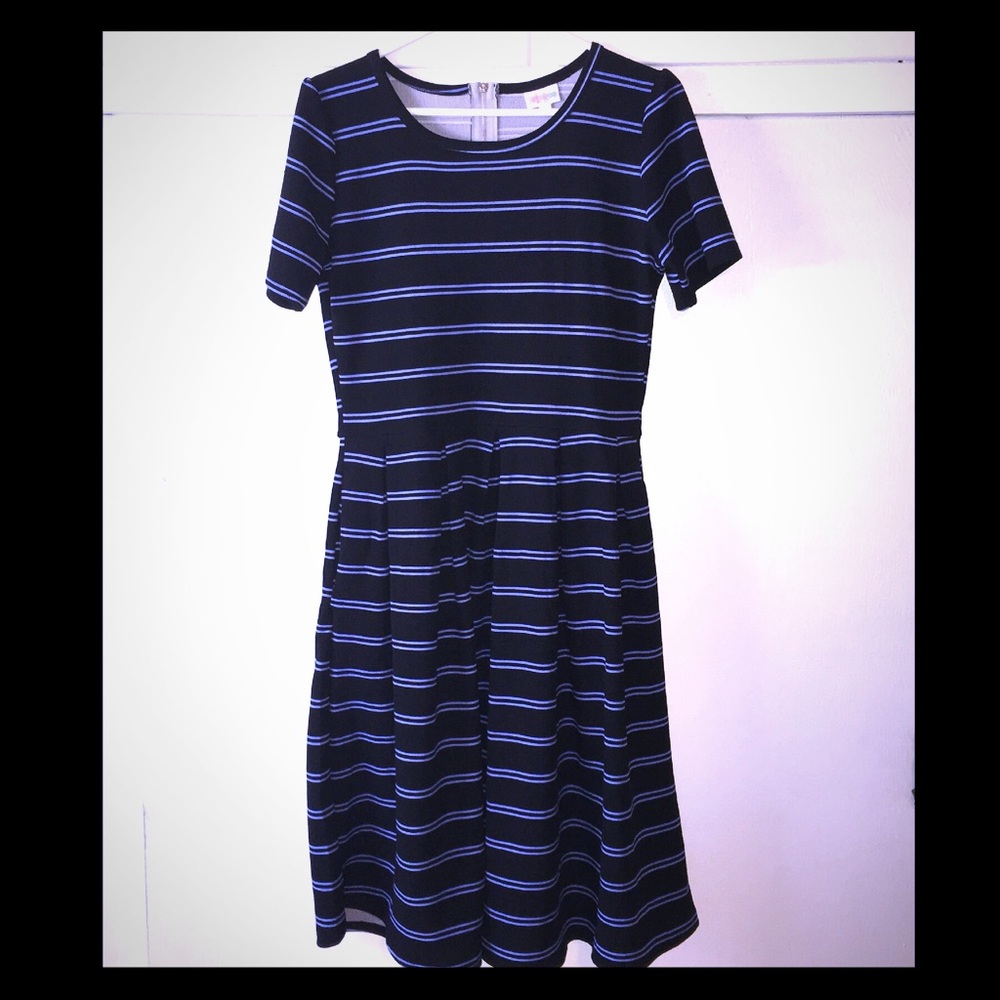 Never worn.  Lularoe Amelia dress